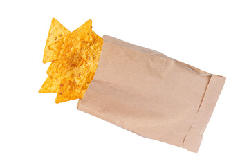 corn chips or nachos  spill out of the small package  isolated on white background top view.