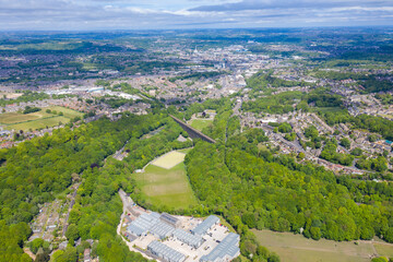 Wall Mural - Aerial photo of the town of Huddersfield, showing the main town centre on a sunny summers day in the summer time in the Borough of Kirklees, in West Yorkshire, England UK
