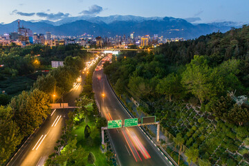 Wall Mural - Evening view of Modares highway and Alborz mountain range in Tehran, Iran