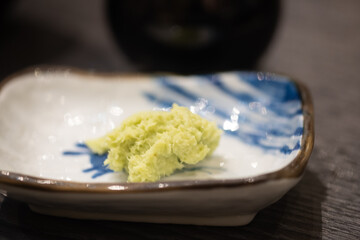 Wall Mural - Green wasabi sauce or paste in bowl