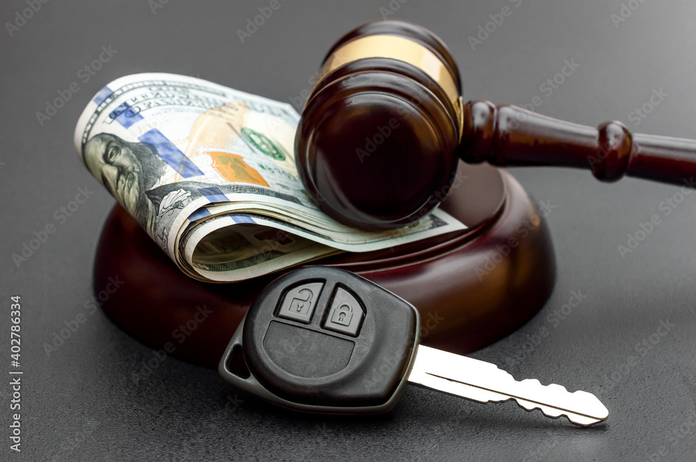 Judge's gavel with car key and money on black. - obrazy, fototapety, plakaty 