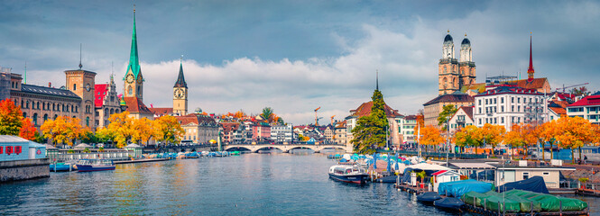 Wall Mural - beautiful autumn scenery. panoramic morning view of fraumunster and grossmunster churches. splendid 