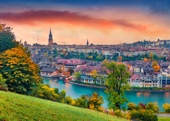 Wall Mural - landscape photography. spectacular autumn cityscape of bern town with cathedral of bern on backgroun