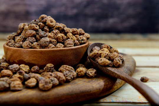 Tiger nuts on a wooden board