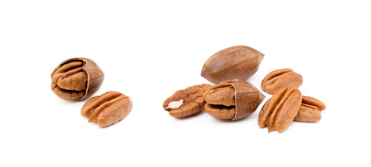 Wall Mural - Fresh pecan nuts isolated on a white background