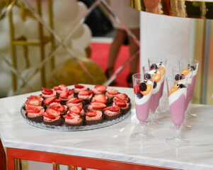 Delicious sweets arranged on the table 