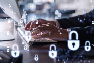 a programmer is typing a code on computer to protect a cyber security from hacker attacks and save c