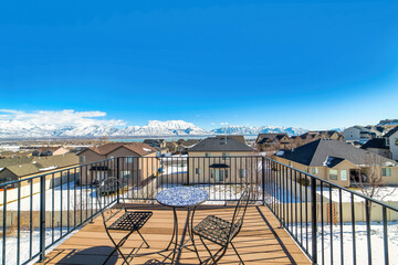 Wall Mural - Home deck overlooking the neighborhood with lake mountain and blue sky views