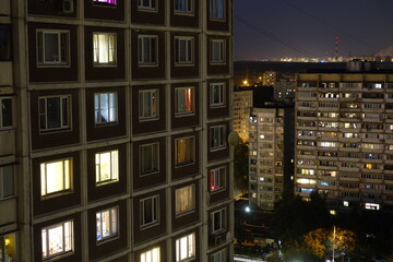 Wall Mural - Light in the houses of the sleeping area at night. Moscow, Russia.