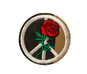 patch with camouflage background, embroidered peace sign and red rose