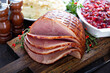 © Sveta - Holiday glazed ham for Christmas dinner with cranberry sauce
