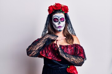 Poster - Young woman wearing day of the dead costume over white doing time out gesture with hands, frustrated and serious face