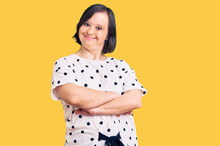 Brunette Woman With Down Syndrome Wearing Casual Clothes Happy Face Smiling With Crossed Arms Looking At The Camera. Positive Person.