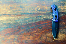 Knife On A Wooden Background
