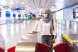 © eakgrungenerd - asian muslim woman wearing medical mask for prevent dust and infection virus walk away in subway station. Coronavirus(covid-19) concept.