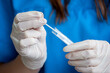 nurse holding nasal swab laboratory test for Coronavirus or COVID-19