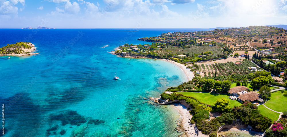 Panoramic aerial view of the coast around the beautiful beach of Kounoupi, close to the town of Porto Cheli, Peloponnese, Greece - obrazy, fototapety, plakaty 