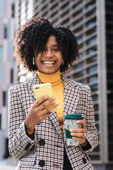 Afro business woman on a break from work.