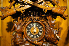 Close-up Of A Wooden, Handcarved Cuckoo Clock Made In Germany.