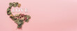 © bedya - Creative flat lay of word love on soft color  background with natural plants