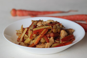 Wall Mural - Stir fried potatoes carrots and chicken for lunch