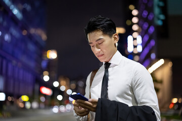 asian businessman call the taxi