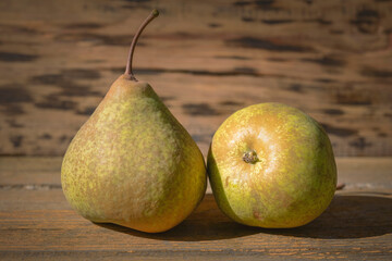 ripe pears on wood