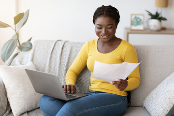 Aufkleber - Freelance Career. Positive Black Lady Working With Papers And Laptop At Home