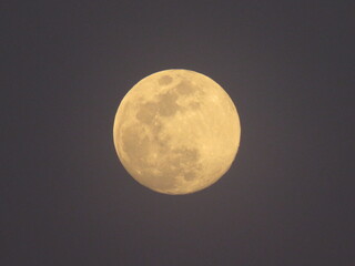 full moon over blue sky