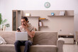 © Elnur - Young male freelancer working at home