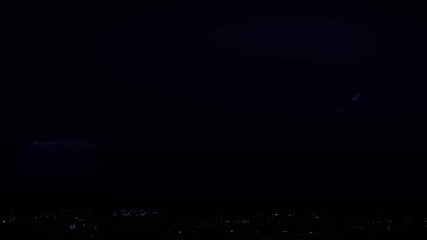 Wall Mural - lightning and thunder over the city at night