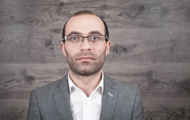 Poster - Caucasian young businessman wearing eyeglasses.