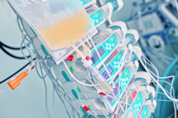 Wall Mural - Intravenous drip and electronic devices in the ICU as a concept of an integrated approach to treatment