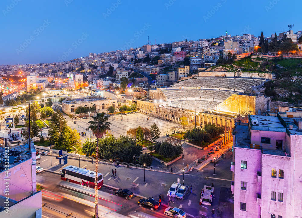 Amman, Jordan. View of the Roman Theater and the city in the evening. - obrazy, fototapety, plakaty 
