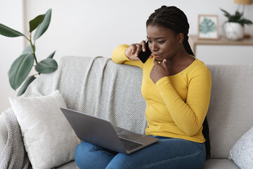 Aufkleber - Busy African Freelancer Lady Talking On Cellphone And Using Laptop At Home