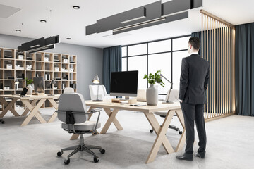 Aufkleber - Businessman standing in modern hipster style office