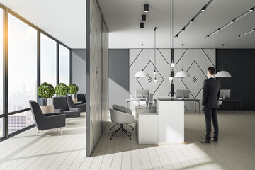 Aufkleber - Businessman standing in coworking loft room