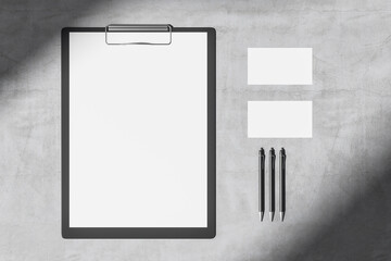 Poster - Top view of concrete desktop with blank clipboard