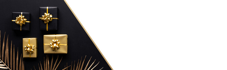 Wall Mural - celebration concepts with gold gift box decoration with mock up leaf on dark background