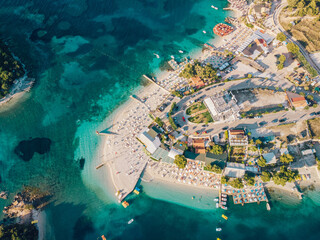Wall Mural - Aerial view of the coastline of the resort town of Ksamil on a sunny summer day. Albania.