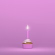 Leinwandbild Motiv A birthday candle lighting on a creamy muffin cupcake on a pink background and colors and space for text