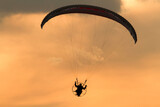 Paragliding at sunset 