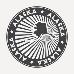  Alaska round logo. Vintage travel badge with the circular name and map of us state, vector illustration. Can be used as insignia, logotype, label, sticker or badge of the Alaska.