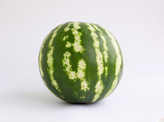 Whole watermelon isolated on white background