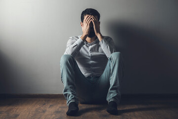 Poster - young sad man hand in head