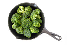 Broccoli Florets In A Frying Pan Close Up Isolated On White Background, Top View, Copy Space
