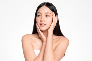 beautiful young asian woman with clean fresh skin, on pink background, face care, facial treatment. 
