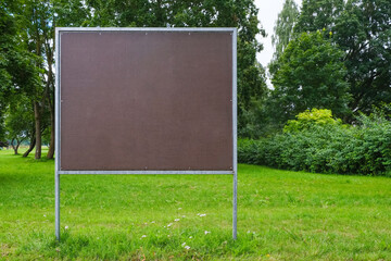 blank notice board, outdoor billboard for advertisements and announcements in public park