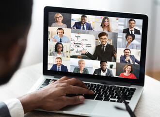 Aufkleber - Unrecognizable african businessman at laptop having corporate meeting in office