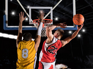 Wall Mural - Two basketball players in action